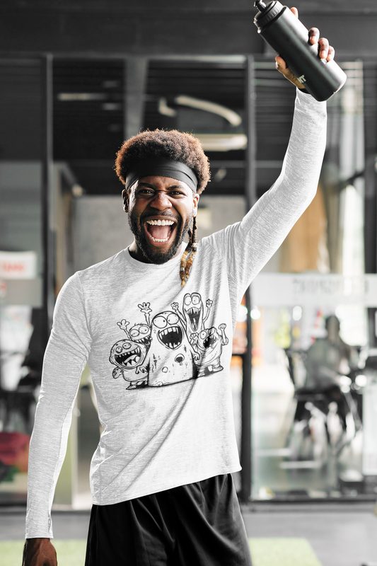 Person in a gym wearing a white t-shirt with cartoon designs and holding a water bottle.